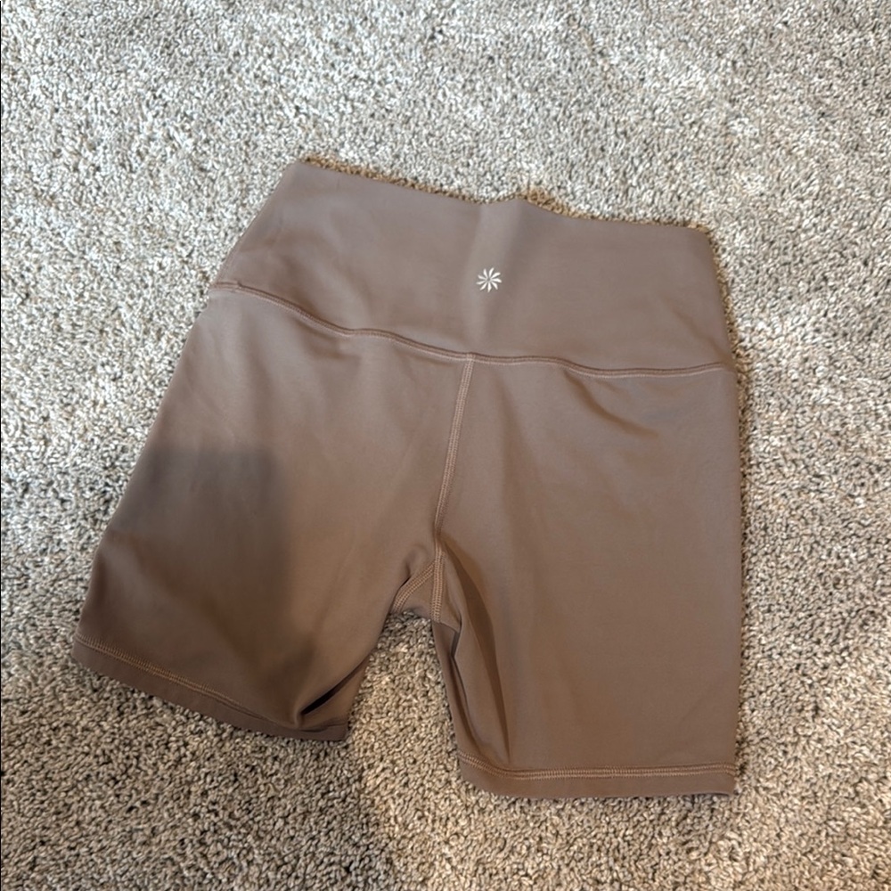 Light brown Athleta biker shorts